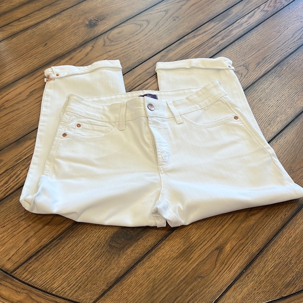 NYDJ crops, white and rhinestone snaps on hem.